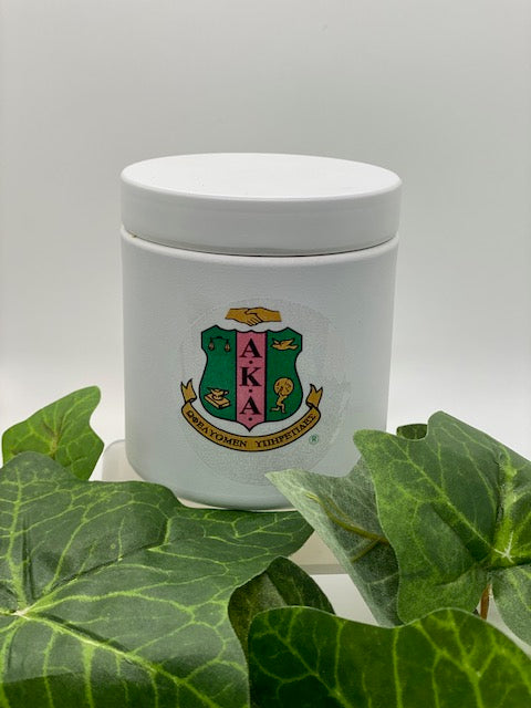 White tin vessel with official AKA shield