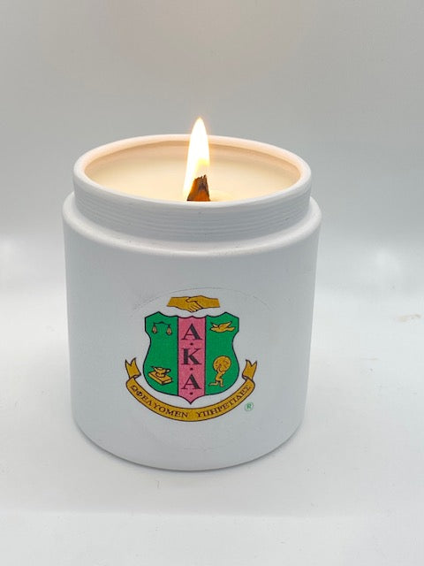 White tin vessel with official AKA shield