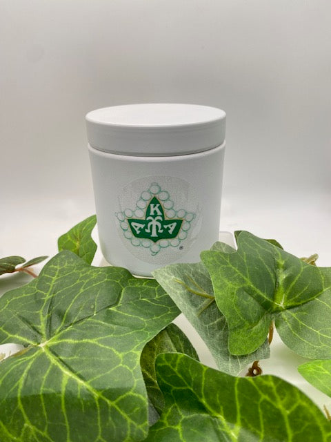 White tin vessel with official AKA ivy